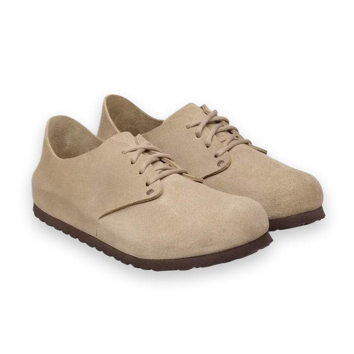 Suola in gomma caucciù naturale e design essenziale Birkenstock Maine unisex scamosciata