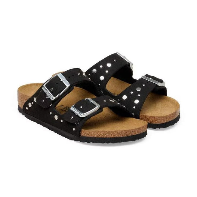 Rivetti decorativi applicati con precisione sui cinturini Birkenstock Arizona Rivet Border Kids