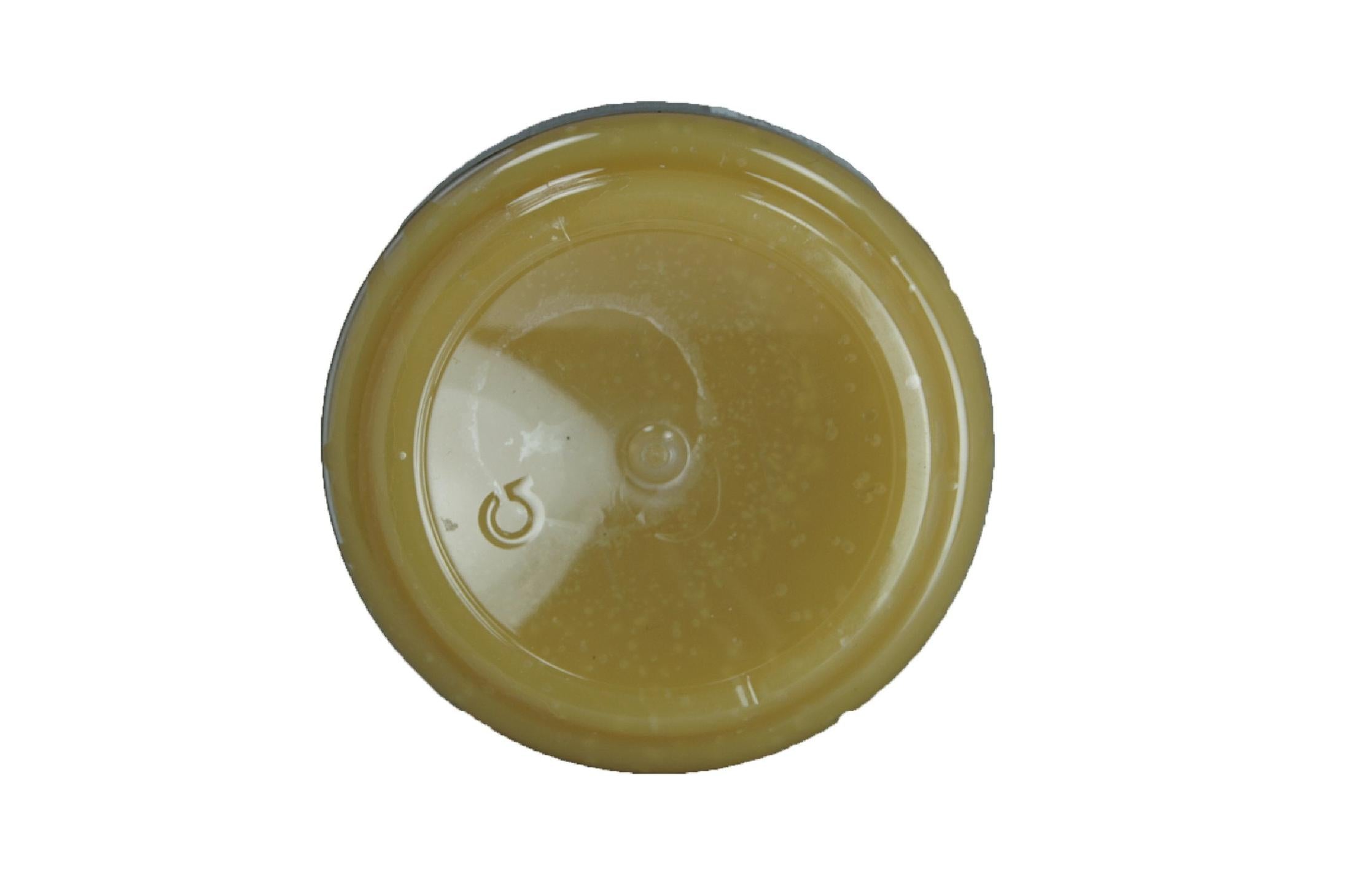 Prodotto ECCO Wax Oil mostrato con il tappo aperto.