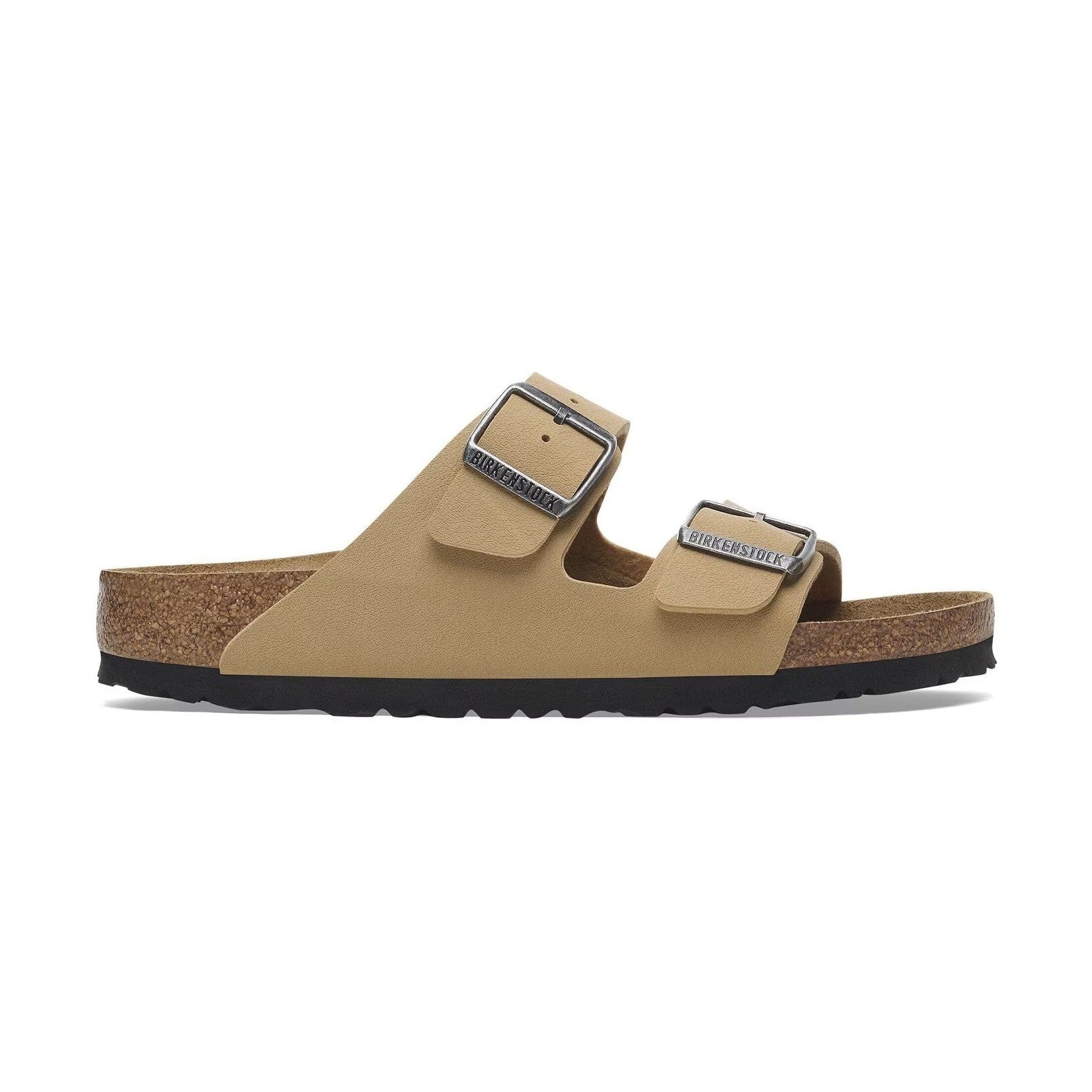 Dettaglio della flessibilità della suola in EVA dei sandali Birkenstock Arizona Donna durante il passo.