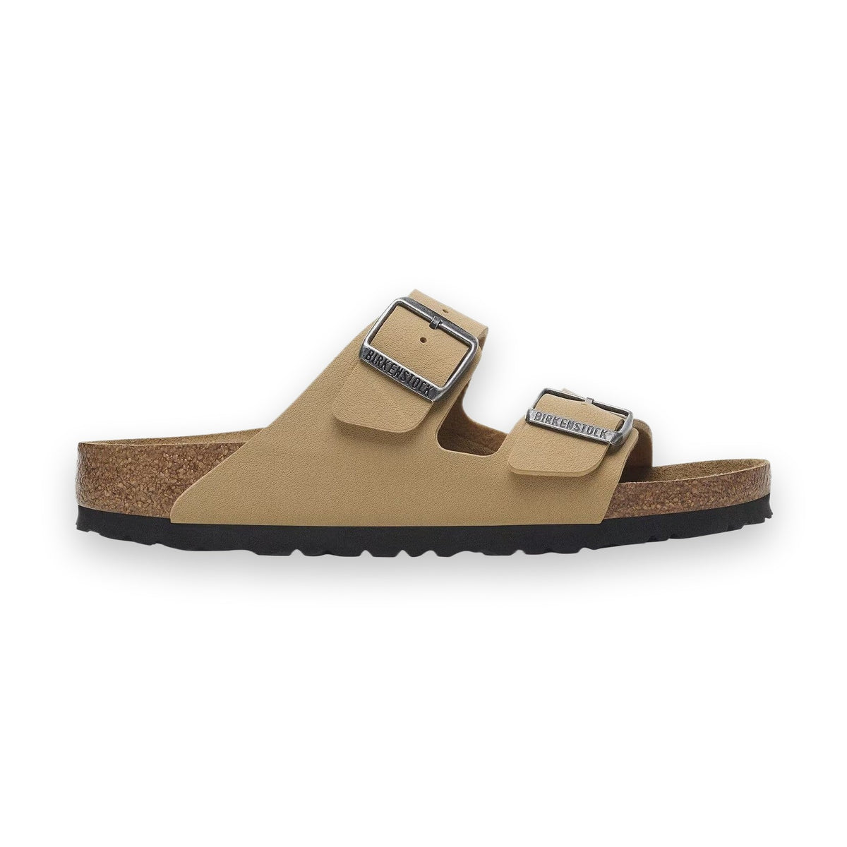 Dettaglio della flessibilità della suola in EVA dei sandali Birkenstock Arizona Donna durante il passo.