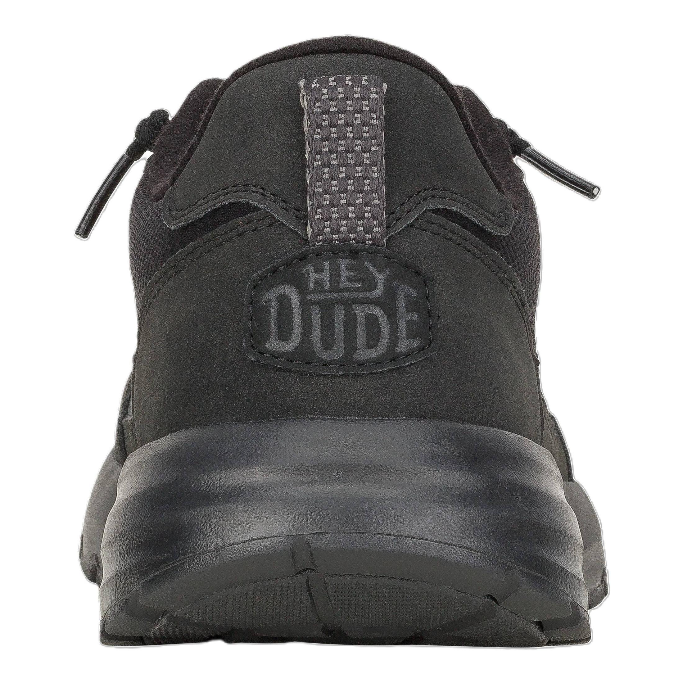 Particolare del tallone strutturato con logo HeyDude e finiture tecniche.