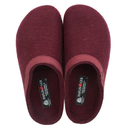 Side view of Haflinger Torben felt clogs in natural wool