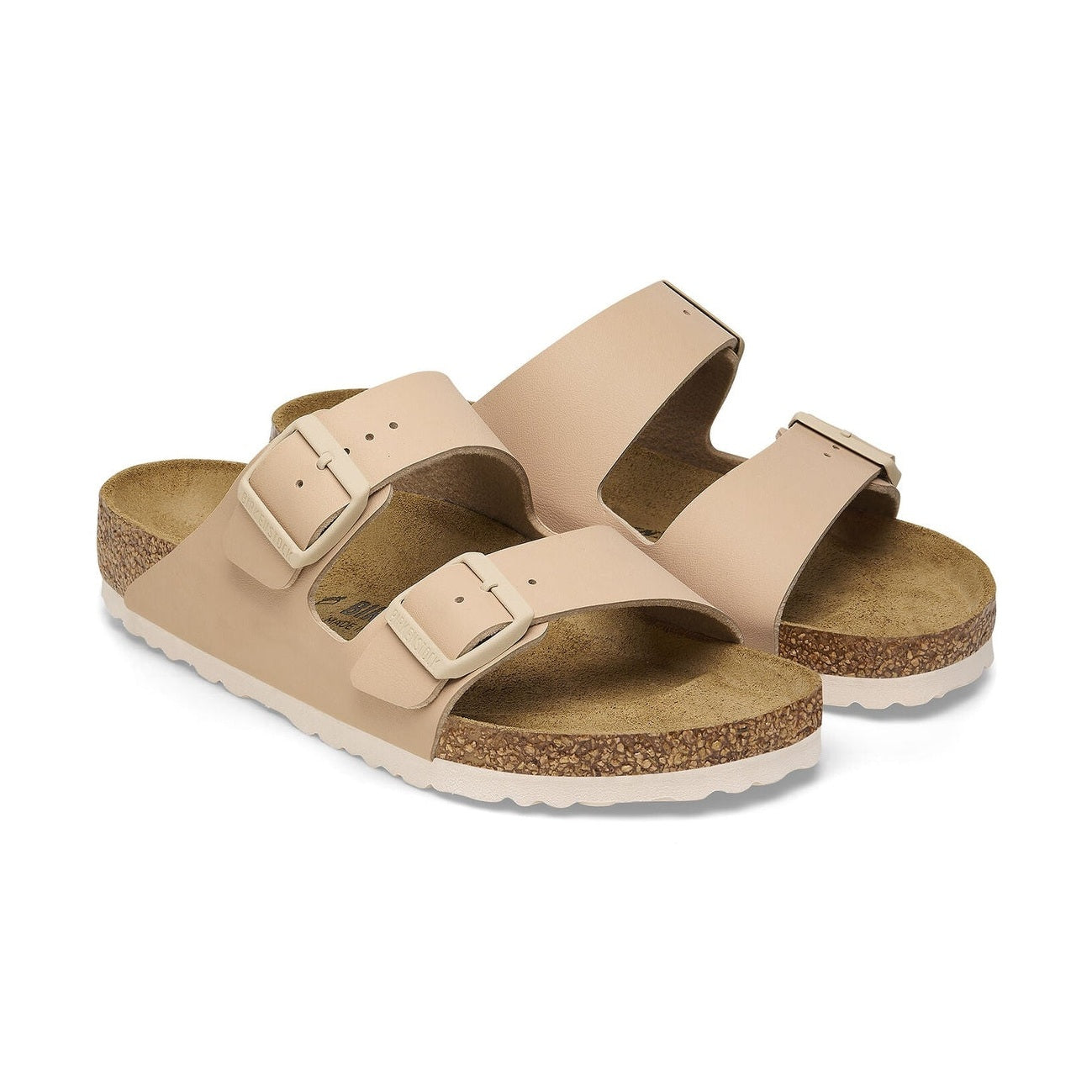 Inquadratura dal basso della suola in EVA ammortizzante con pattern antiscivolo Birkenstock Arizona Donna.