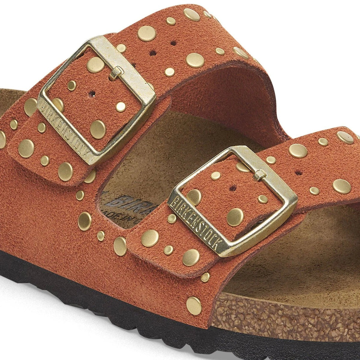 Dettaglio rivetti metallici e fibbie sandalo Birkenstock Arizona Rivet donna