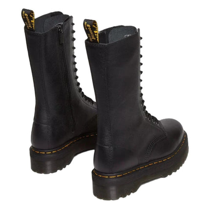 High-rise combat boots with chunky sole and signature stitching – 1B99 Quad by Dr. Martens