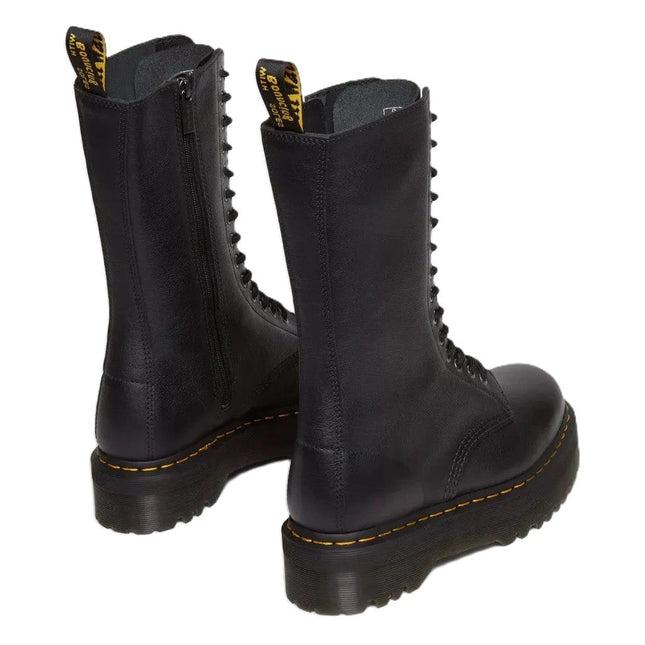 High-rise combat boots with chunky sole and signature stitching – 1B99 Quad by Dr. Martens