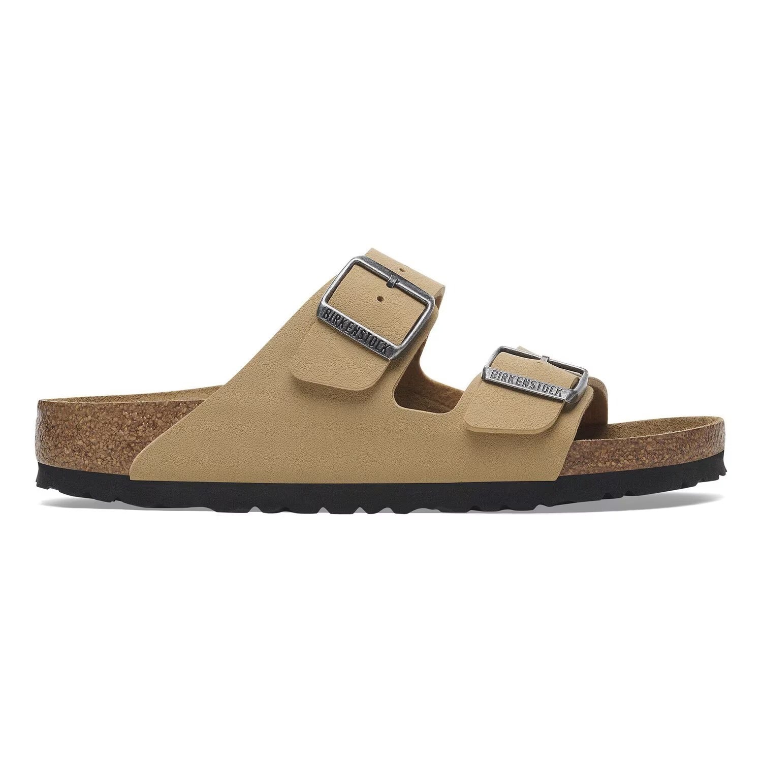 Dettaglio della flessibilità della suola in EVA dei sandali Birkenstock Arizona Donna durante il passo.