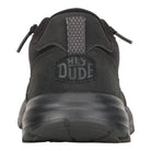 Particolare del tallone strutturato con logo HeyDude e finiture tecniche.